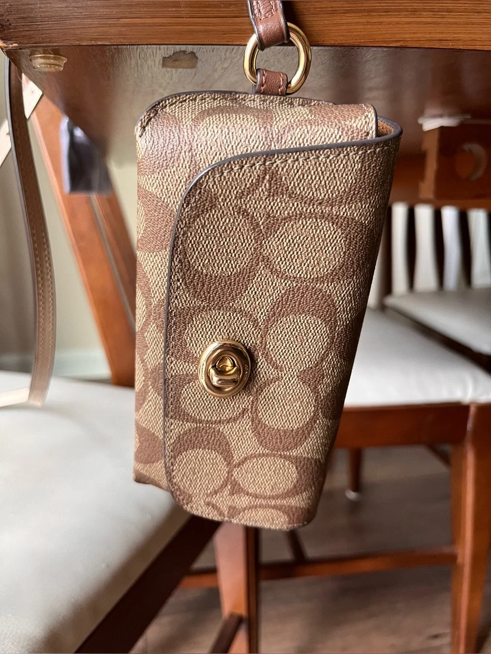 Coach glasses pouch in Signature khaki/tan! Clip on your bag or belt loop!